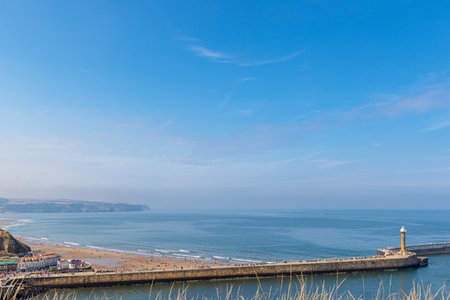 View of the sea from the promenade in Dorset, Englandの写真素材