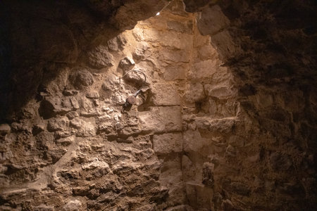 Old stone wall in the cave, close-up, background.の写真素材
