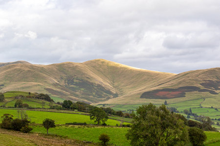 Beautiful landscape with rolling hills in the Peak District National Park, UKの写真素材