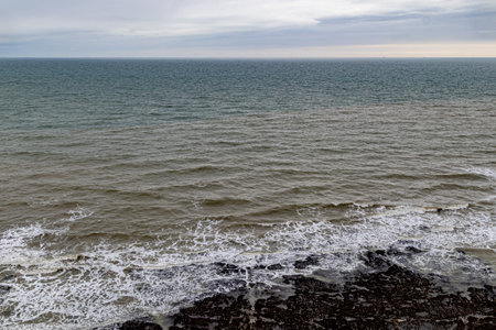 Coast of the Baltic Sea in cloudy weather, Latvia, Europe