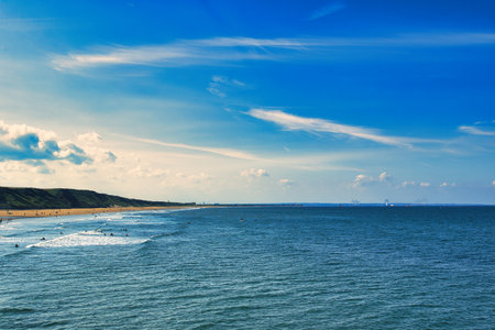 Seascape with blue sky and white clouds over the sea.の写真素材