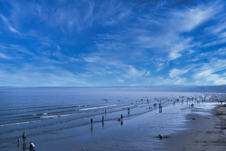Landscape view of the sea and blue sky with white clouds.の写真素材