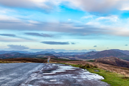 Countryside road in the Peak District National Park, England, UKの写真素材