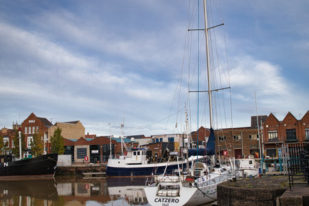 Boats and yachts moored in the harbor of Whitby.の写真素材
