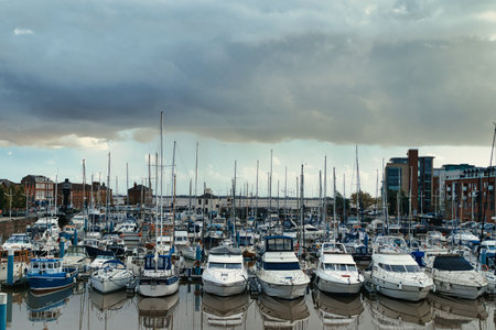 Luxury yachts and motor boats moored in the harbor.の写真素材