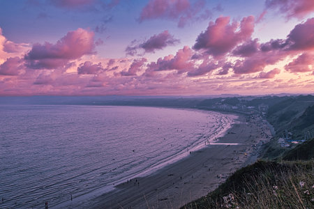 Sunset over the beach at Polzeath Cornwall England UK Europeの写真素材