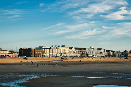 Walking along the seaside promenade in Cambridgeshire, Englandの写真素材