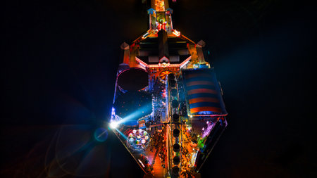 Beautiful light show in the night. Colorful background with neon lights.の写真素材