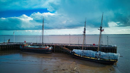 Fishing boats moored at the quay in the evening.