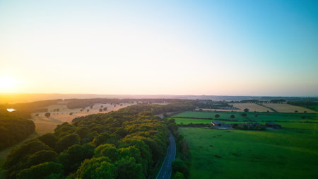 Aerial view of rural landscape at sunset. Drone photography. Panoramic view.の写真素材
