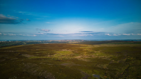 Aerial view of the Scottish Highlands during a sunny summer day.の写真素材