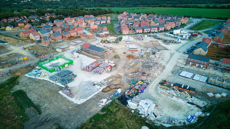 Aerial view of a construction site with multi-storey houses