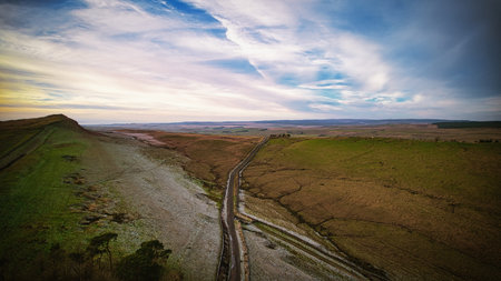 Aerial view of a rural road on the yorkshire woldsの写真素材