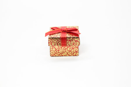 gift box with red ribbon ties. Selective focus.の写真素材