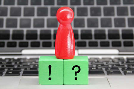 peg doll, colored wooden block with question and answer marks