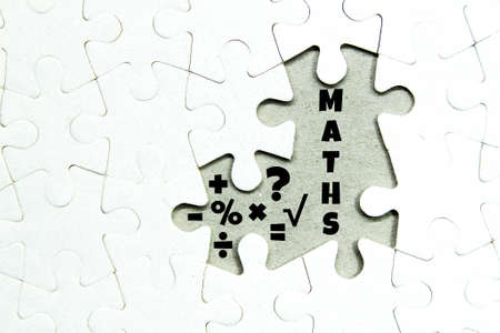 jigsaw puzzles with maths words and maths icons. mathematical conceptsの写真素材