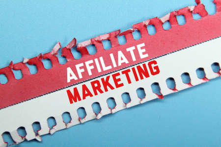 white and red torn paper with the words affiliate marketingの写真素材