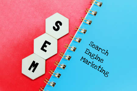 hexagon, notebook with SEM letters. business concept