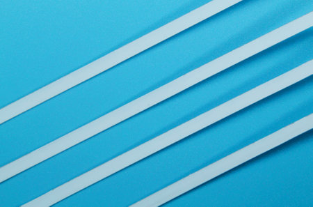 four white lines with a blue background. abstract conceptの写真素材