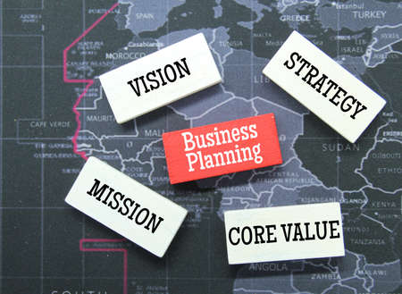 Red and white wooden blocks with the words for business planning