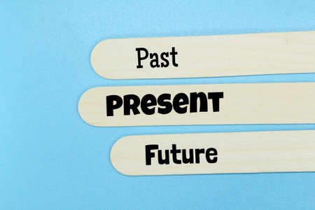 an ice cream stick with the words Past Present Futureの写真素材