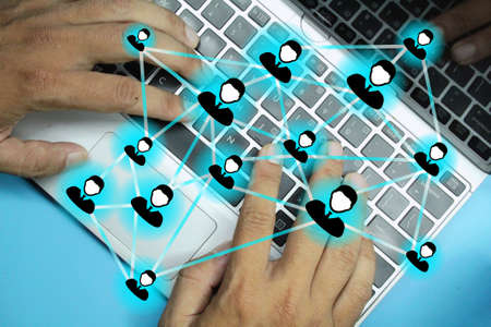 hands on with a laptop and a network marketing system, social network or Relationship