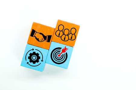 colored cubes with management, agreement, target and team icons. business development