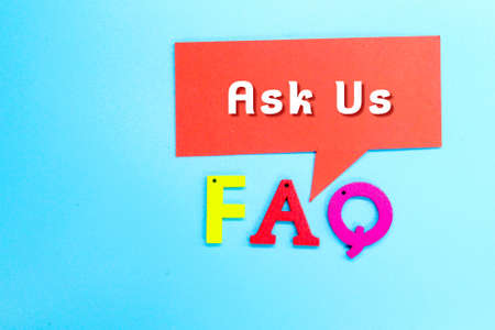 a red chat box with the words Ask Us and FAQの写真素材