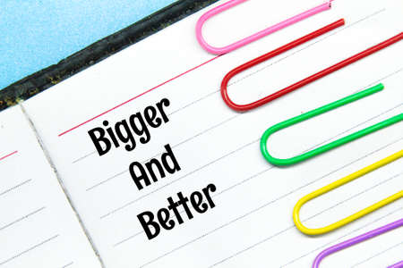 colored clicks, notebooks with the words bigger and better