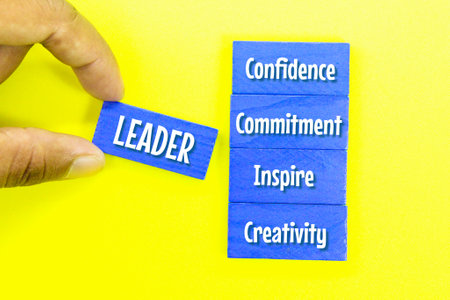 hand holding a colored board with great Leader attributesの写真素材