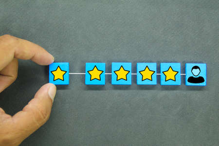 Customer reviews are a good five-star rating concept and positive customer feedbackの写真素材