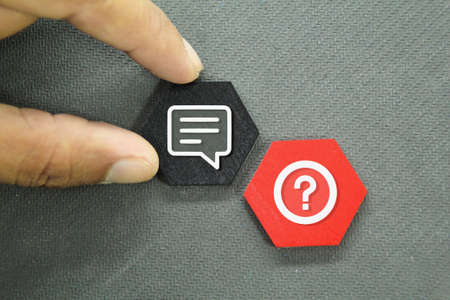 hexagon and hand out answer and on the question. problem solving conceptsの写真素材