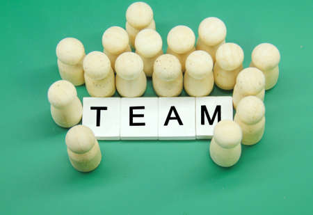 pegdoll gathered with the word team in the middleの写真素材