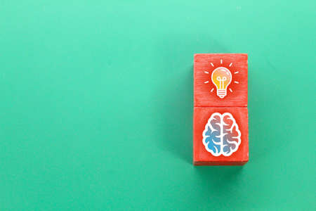 colored cubes with bulb and brain icons. the concept of innovationの写真素材