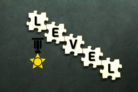Wooden puzzles are arranged ascending with level words