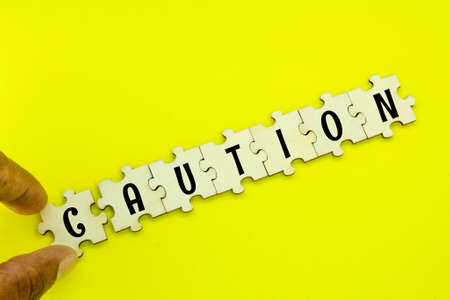 hexagon with the word caution. the concept of safety