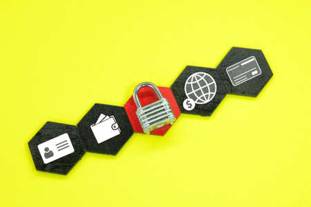 hexagon with wallet, debit card, identity and internet icons and keys in the middle