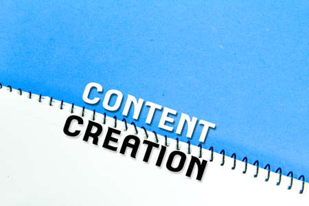 white paper with the word content creation. the concept of content creation