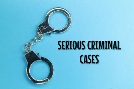 police handcuffs with the words serious criminal cases