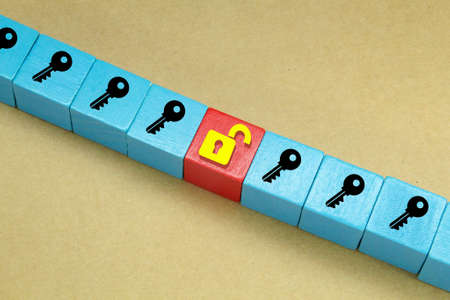a blue cube with a lock icon and a red cube with an open lock. the concept of safetyの写真素材