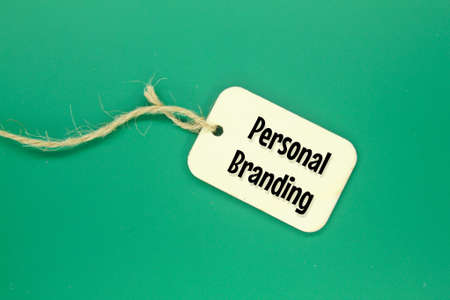 wooden tags are tied with the word personal brandingの写真素材