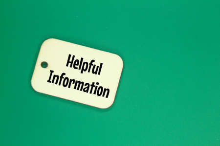 wooden tag with the word helpful information