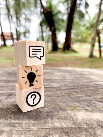 colored cubes with question and answer icons above. the concepts of Q and Aの写真素材