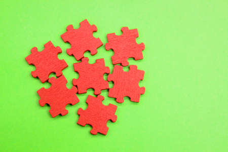 Puzzles not yet listed. Unresolved colored wooden puzzle piecesの写真素材