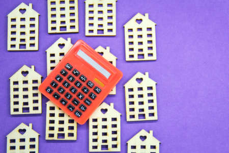 calculator on the housing. the concept of buying a house or buying a houseの写真素材