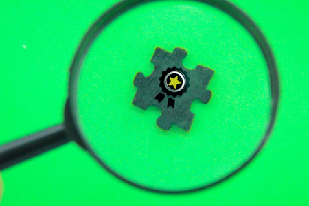 magnifying glass by looking for quality. the concept of guaranteed qualityの写真素材