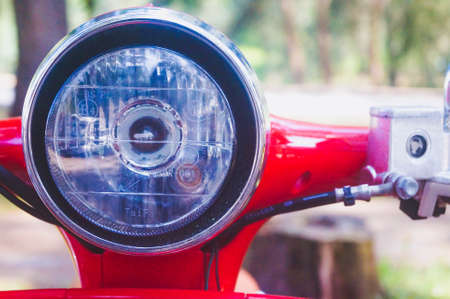 Malaysia, kuala Terengganu 2 June 2022 : close -up view of the red Vespa headlights