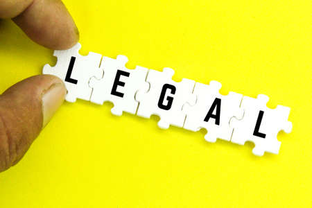 White puzzle with the word legal. the concept of lawの写真素材