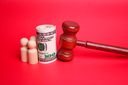 mallet, paper money and wooden figure. the concept of justice in financeの写真素材
