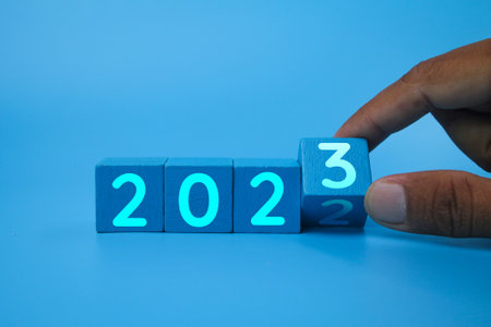 blue cube with the number 2023. Beginning and start of the new year 2023. Preparation for happy new...